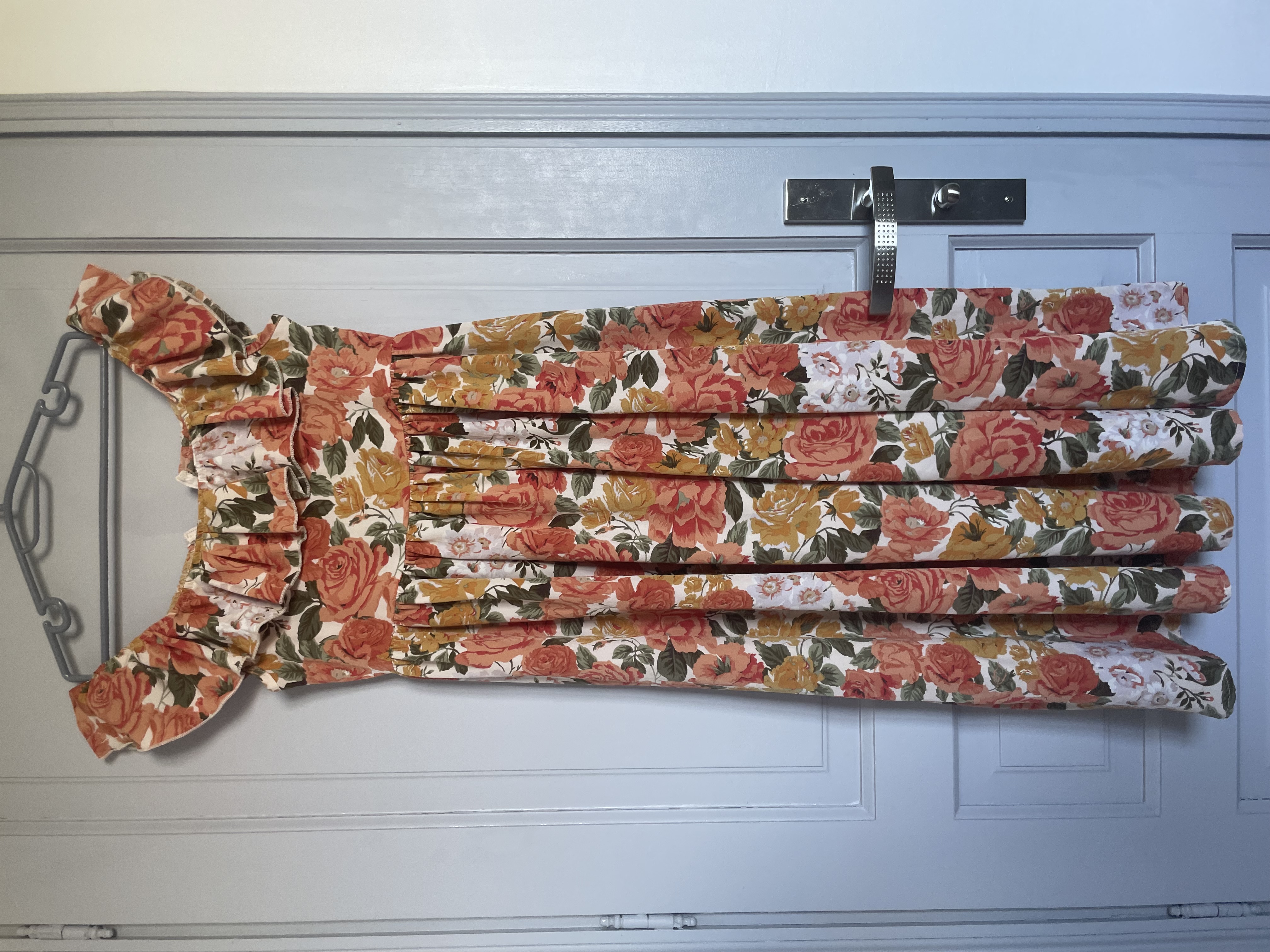 Robe orange fleuri